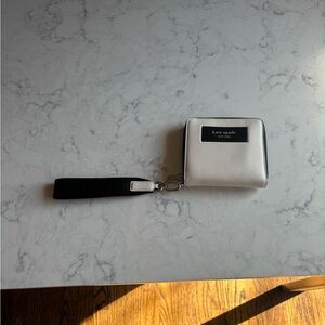 kate spade White Leather Zip Wristlet Wallet with Black Strap